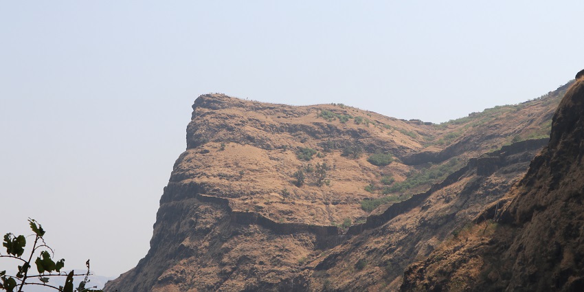 Scenic view of Takmak Fort, surrounded by lush landscapes and various scenic hills.