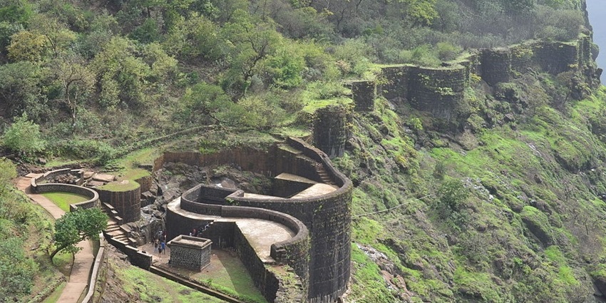 Long view of Raigad Fort showcasing its impressive structure and surrounding landscape.