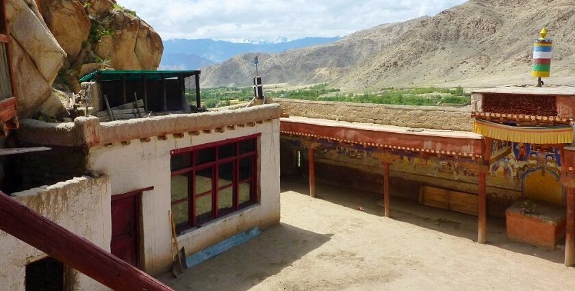 Panoramic view from roof of Thagthok Gompa showing courtyard and wall paintings-Takthok Monastery