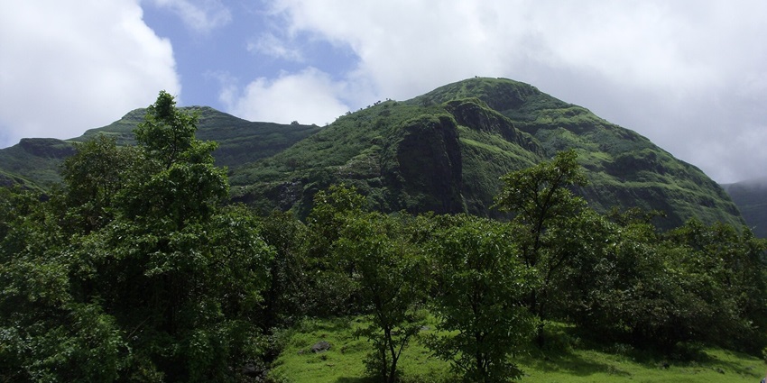 Picturesque view of Beautiful Tamhini ghat waterfall in rainy season - places to visit in Pune in monsoon