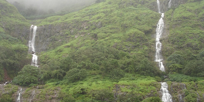 An image of the serene, misty hills and waterfalls along the Tamhini Ghat road.