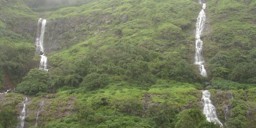 Tamhini Ghat features stunning mountain passes with waterfalls and lush greenery.