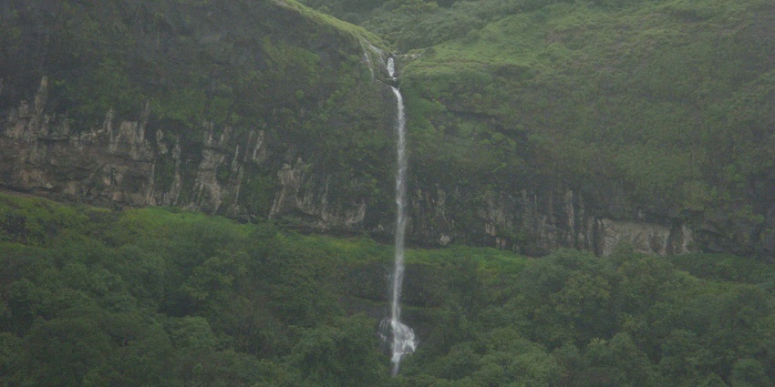 This cascading waterfall near the ghat is a great site for a rejuvenating experience.