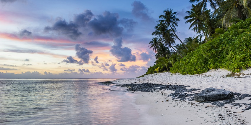 The Tarkarli Beach, which is a serene beach with clear waters, perfect for water sports.