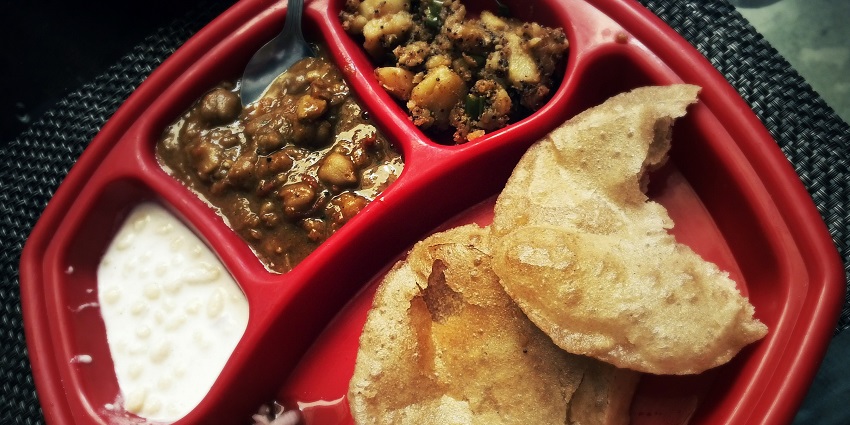 Chole Bhature, a popular Punjabi dish, is among must-try things to do in Punjab.