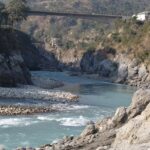 Beautiful view of Tattapani hot springs next to the Surej River with the bridge.