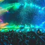 A vibrant shot of techno enthusiasts dancing to pulsating beats.