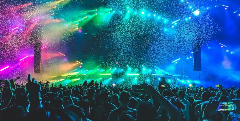 A vibrant shot of techno enthusiasts dancing to pulsating beats.