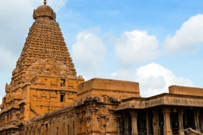 Image of beautiful Temple in Tanjore with golden reflection and clear sky background