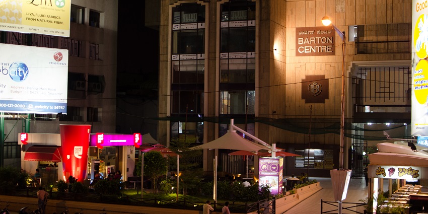 Interior view of The 13th Floor rooftop bar with stylish seating and ambiance.