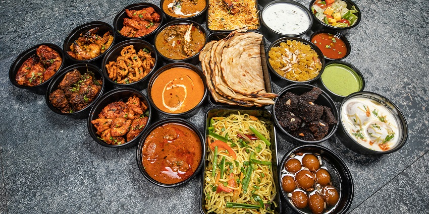 A wide selection of North Indian food including biryani, parathas, gravies, dry curries, raita and sweets.