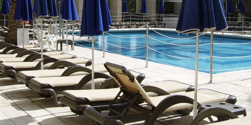 Pool party in the Central Park hotel with lush gardens and modern amenities