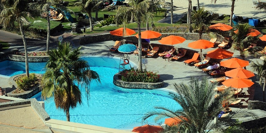 The Greenwood Resort is a nature-inspired resort featuring tranquil surroundings and recreational facilities.
