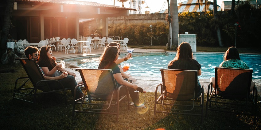 A family enjoying a pool party in Jaipur at The Lalit.