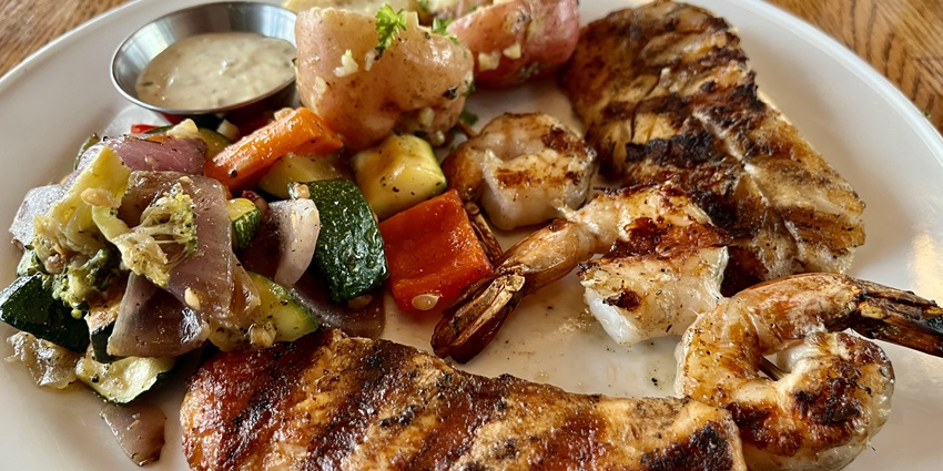 Riverside restaurant offering seafood with laid-back, scenic ambiance.