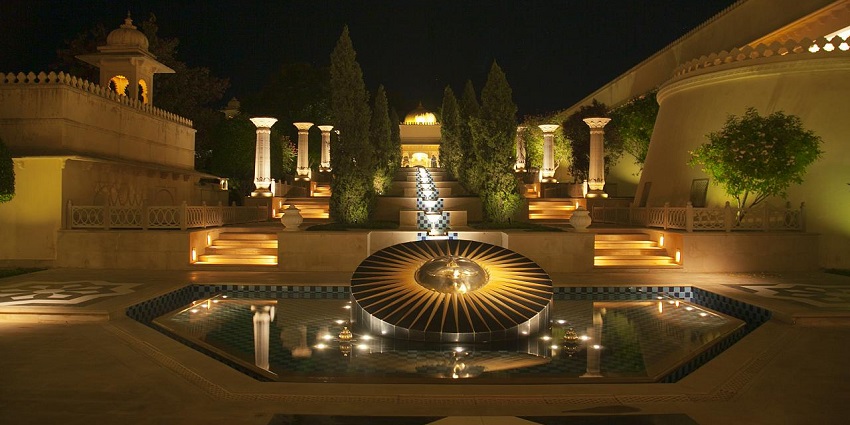 Pool party in Udaipur hotel known for its royal architecture and lavish amenities.