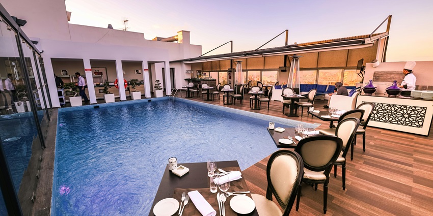 An image of the stunning Ten Suites provides personalized service and cozy suites.