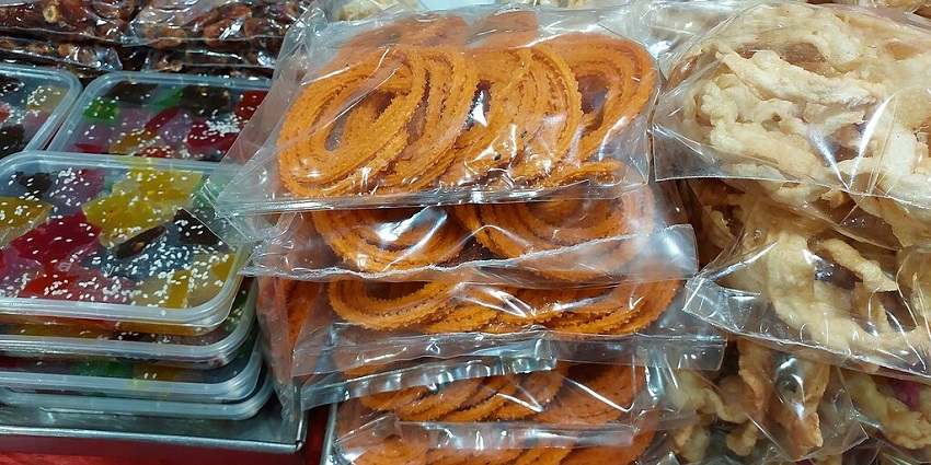 Coconut milk-infused murukku, crunchy and perfect for snacking.