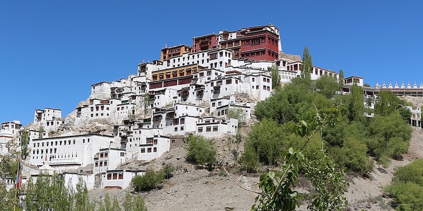 Thiksey Monastery in Ladakh, showcasing stunning architecture against a mountain backdrop.