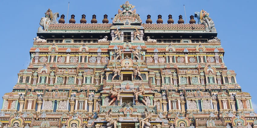 Detailed artwork on the gopuram of Nataraja Temple, a famous temple in Tamil Nadu.