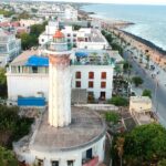 An aerial view of Karaikal city buildings near the coastline, with the Bay of Bengal.