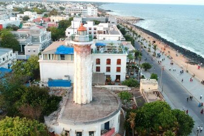 An aerial view of Karaikal city buildings near the coastline, with the Bay of Bengal.