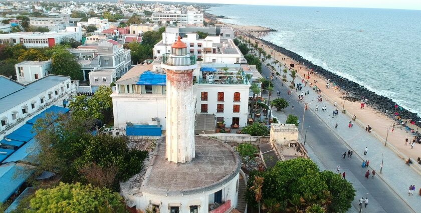 An aerial view of Karaikal city buildings near the coastline, with the Bay of Bengal.