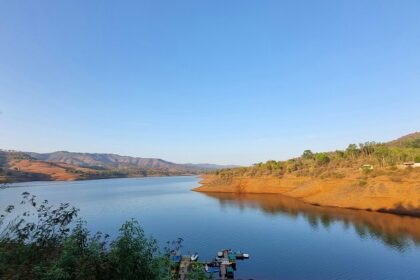 A wonderful view of Panshet Dam with calm waters and mountains in the background.