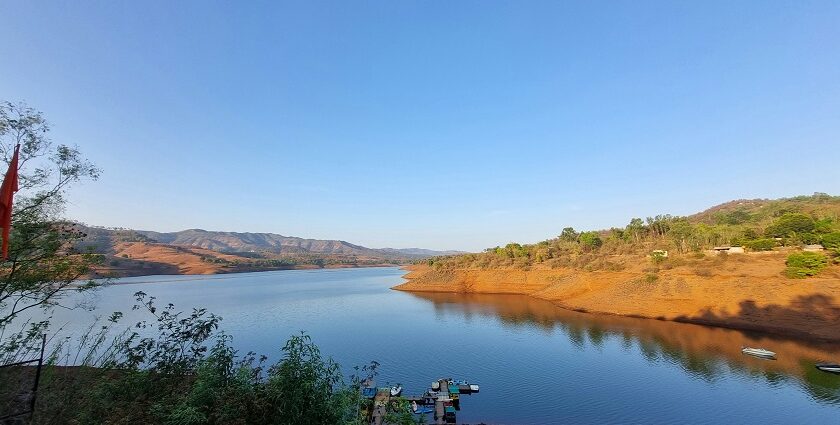 A wonderful view of Panshet Dam with calm waters and mountains in the background.