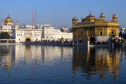 A beautiful view of the Akal Takht and Harmandir Sahib in Amritsar, Punjab.