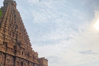 A picture of a cityscape with illuminated temples, a must-see among things to do in Thanjavur.