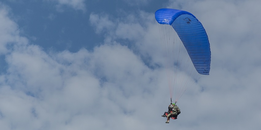 Thomas Holiday, a vendor for paragliding in Daman, offers training beforehand.