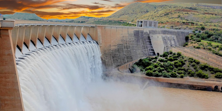 A picture of a dam, with its serene waters and greenery, is a quiet place to visit in Gudalur