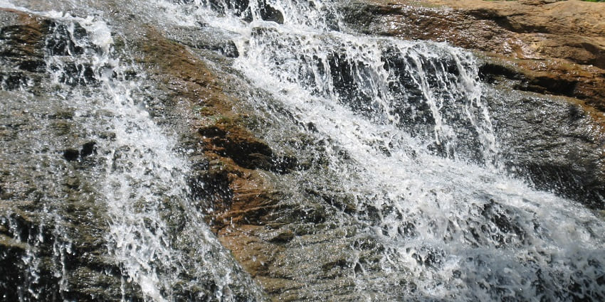 Thottikallu Falls: A unique waterfall surrounded by serene landscapes.