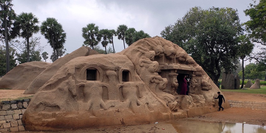 This cave gets its name from the rock carving of tiger-like heads