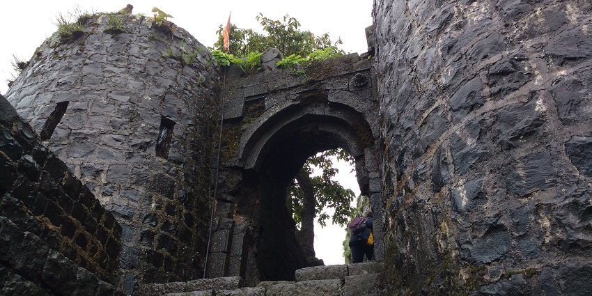 A panoramic view of Tikona Fort, a historical hill fort located in Maharashtra, India