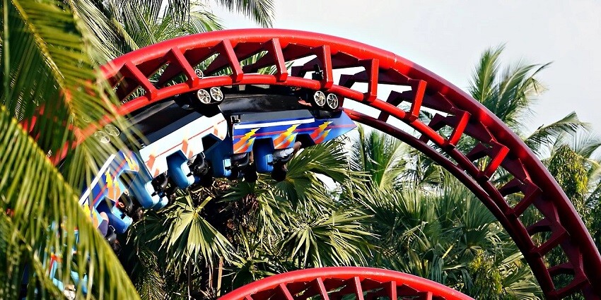 An image of a roller coaster with blue tracks.