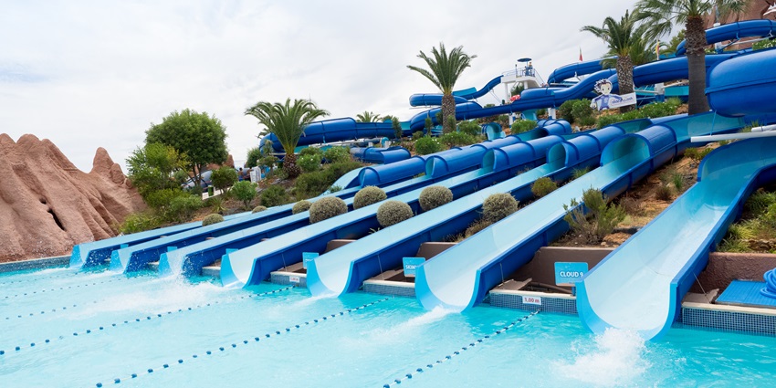 Amusement park: thrilling rides, boating, greenery, and picnic spots.