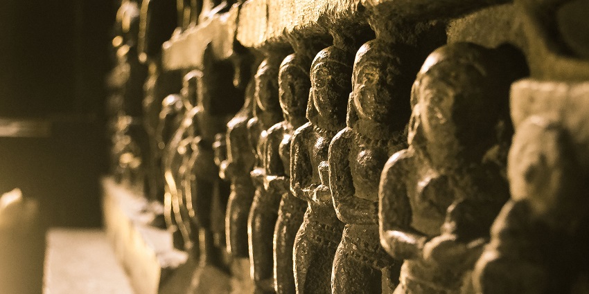 Intricate carvings in the temple, showcasing detailed craftsmanship and design.