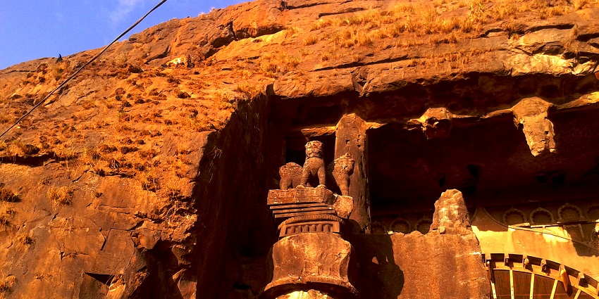 Panoramic view of the Karla Caves, showcasing ancient rock-cut architecture.
