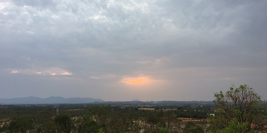 A serene view a cool dusk on a hillock in Tiptur - sunset view during evening time