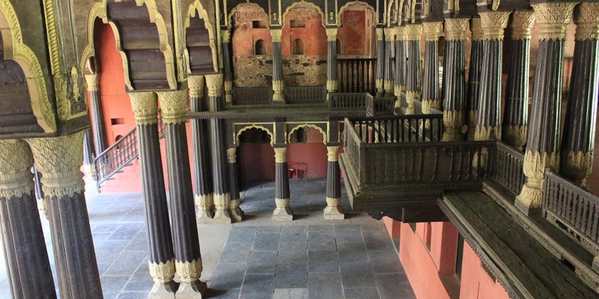 A grand teakwood palace with Indo-Islamic architecture, showcasing Tipu Sultan’s belongings.