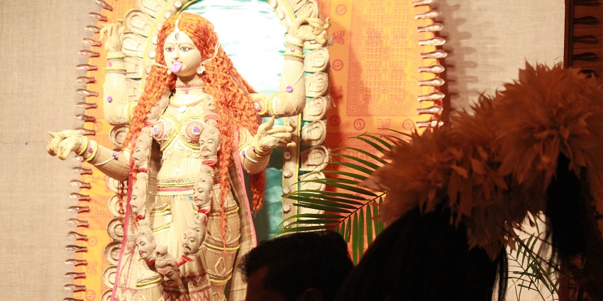 An idol of Goddess Durga in a temple during Durga Puja festival.