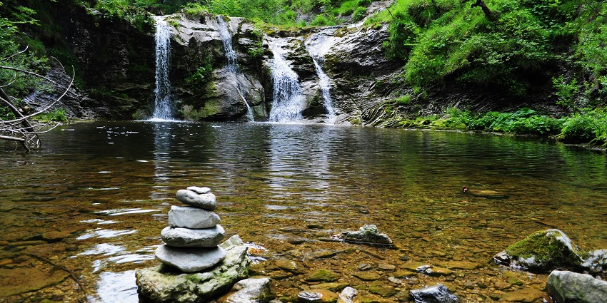An image of Tiu Kelep Waterfall, a stunning spot on the island to explore nature.
