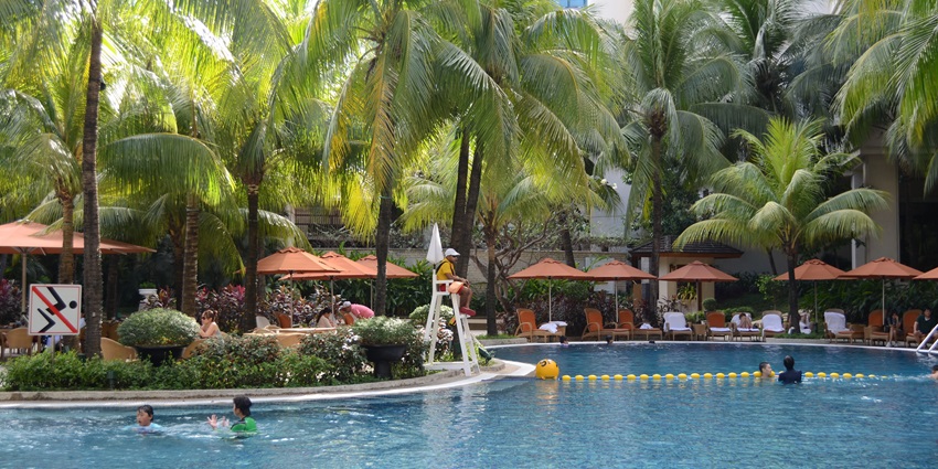 Luxury resort featuring a tranquil atmosphere and lush greenery.