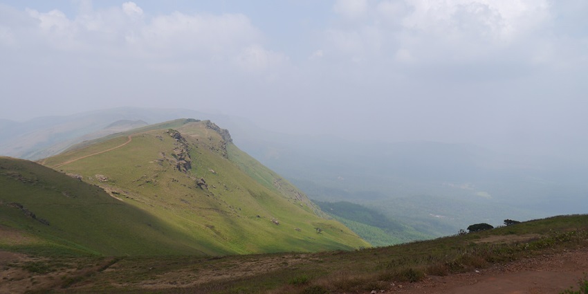 Baba Budangiri Trekking features scenic trails, lush landscapes, and adventure.