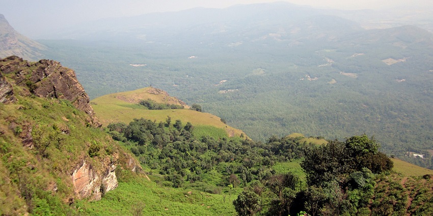 Things to do in Chikmagalur include trekking at Mullayanagiri with breathtaking views, lush trails.