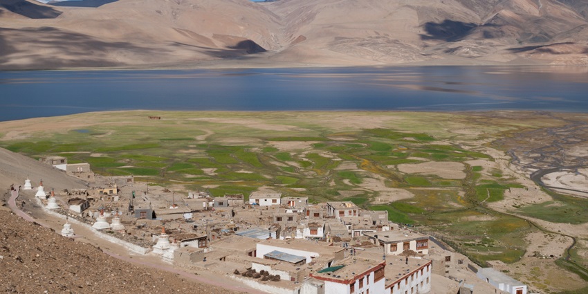 Tso Moriri Lake from Karzok village, showcasing the serene waters surrounded by snow-capped peaks