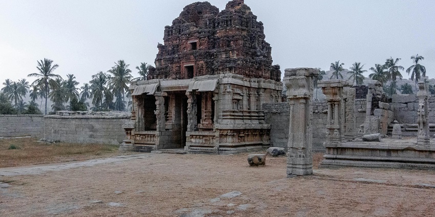 A view of an ancient temple, a popular destination near Paranda Fort, showcasing stone carvings.
