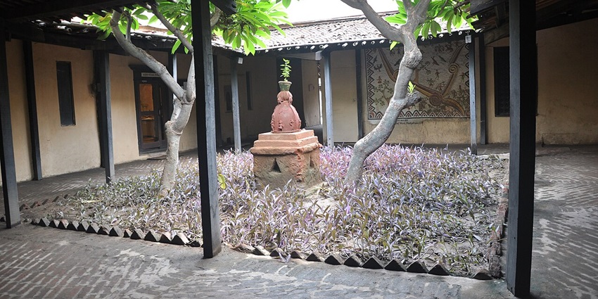 Artifacts and sculptures displayed inside the culturally rich Tulsi Museum hall.